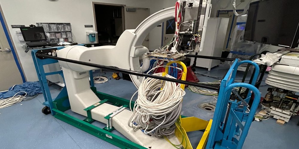 MRI unit on transport skates, prepared and staged for shipment