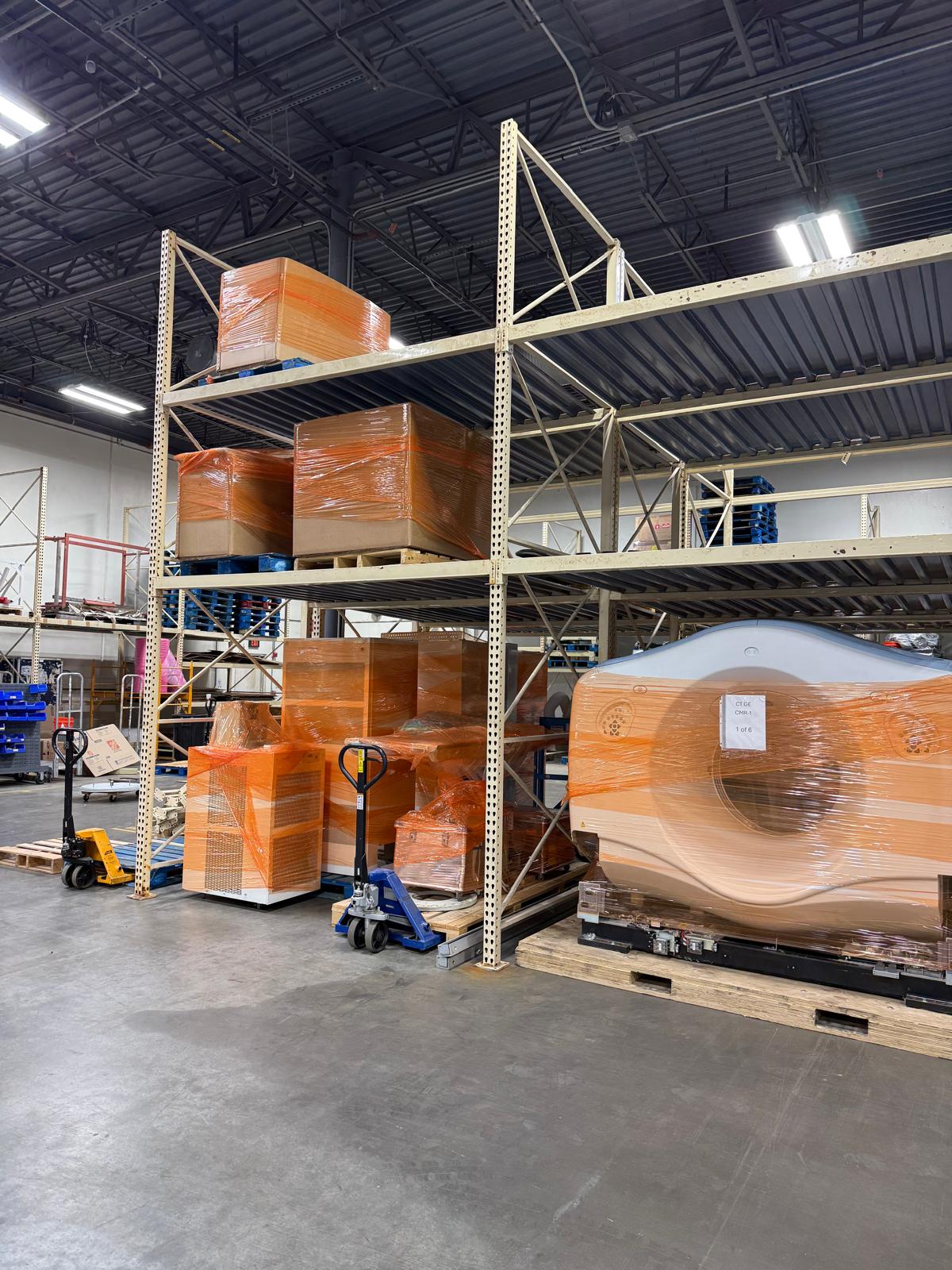 Wrapped scanner components racked in the Virginia Beach warehouse